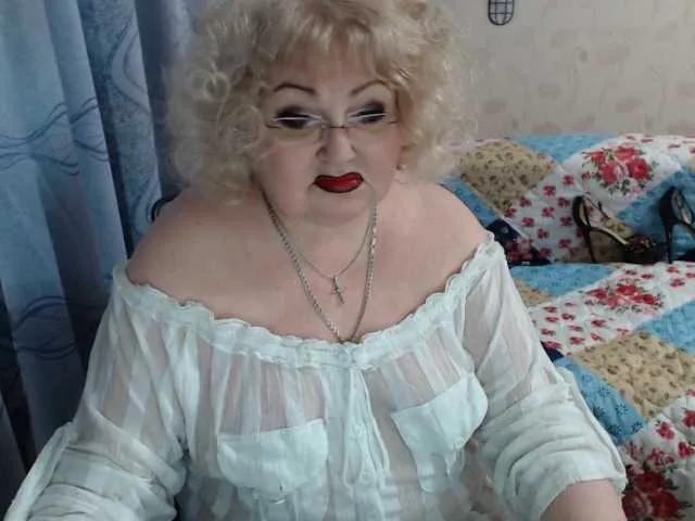 livingnextdoor — really mature woman with curvaceous sexy body...very  blond hair...  sexy nails... big nipples and nature very hairy pussy...hard clit between very very very long pussylips ! looking for young student for give some sex lessons or men who know how make...
